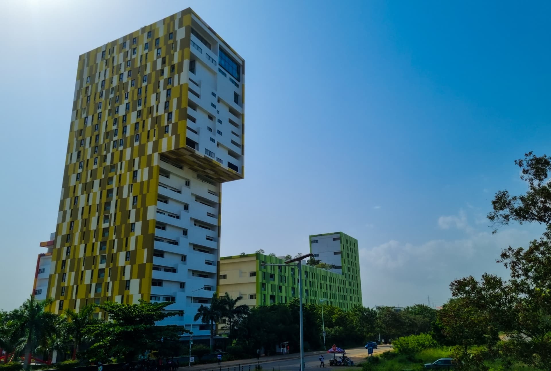 Modern tall building with yellow and white blocks