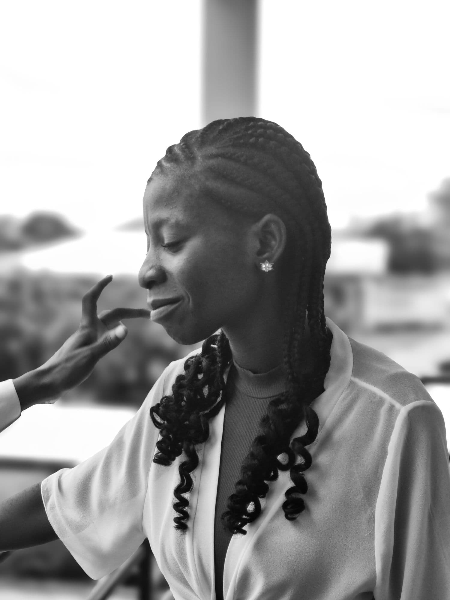 Portrait of a woman with braids