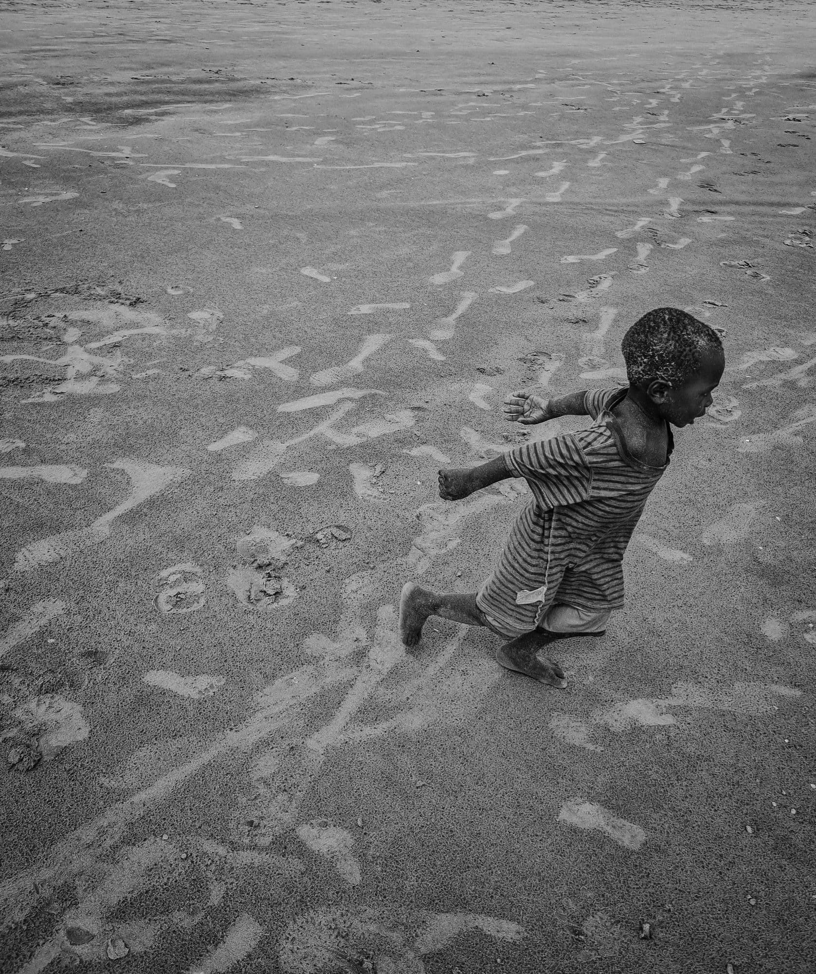 Child running on the beach