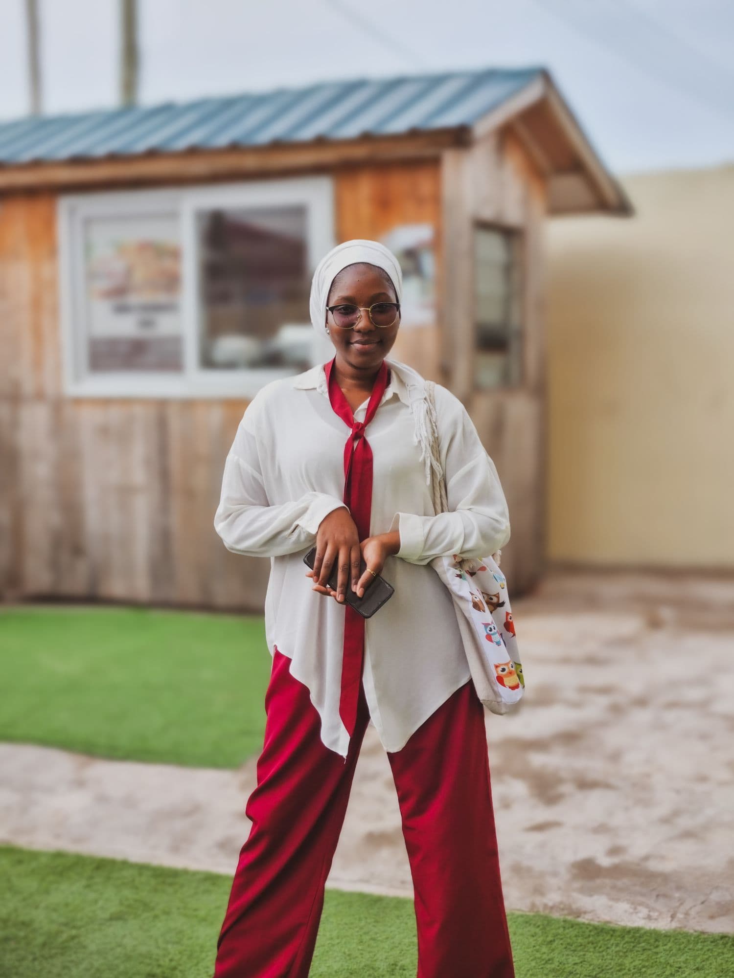 Woman in bold white and red