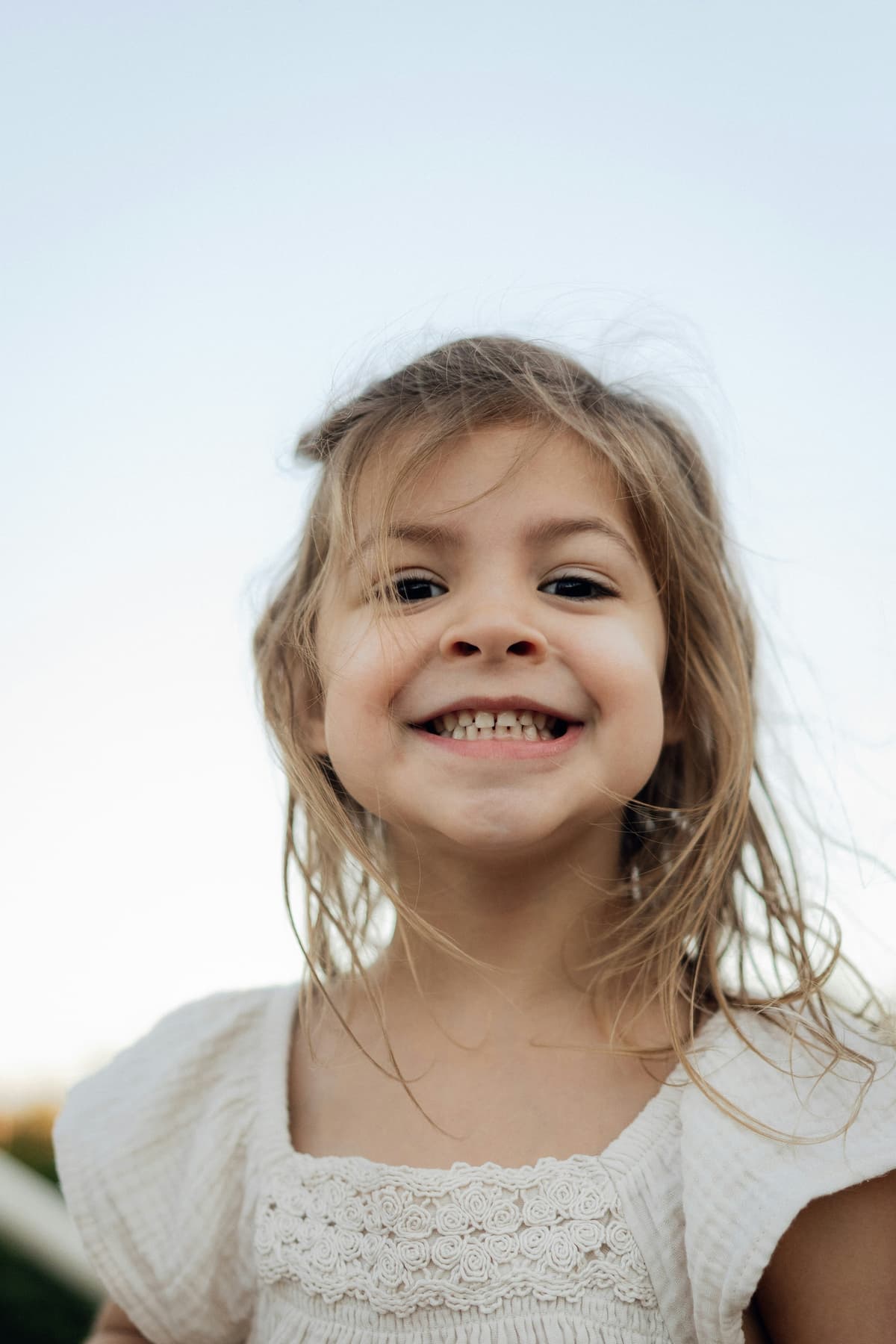 Intimate wedding moment between bride and groom in romantic setting